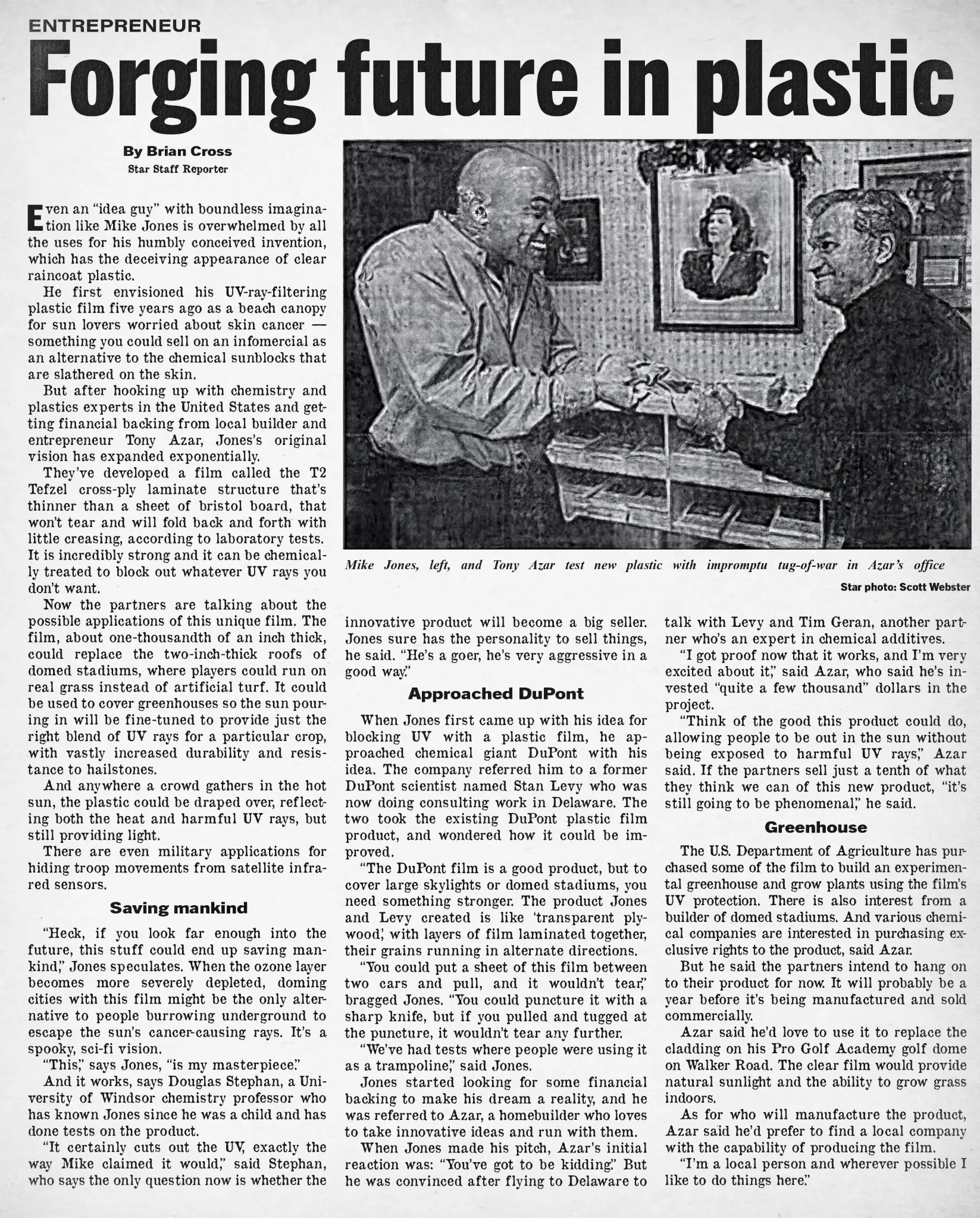 Full-size Windsor Star newspaper feature titled Forging future in plastic, showing Michael Jones and Tony Azar testing an early transparent plastic material.
