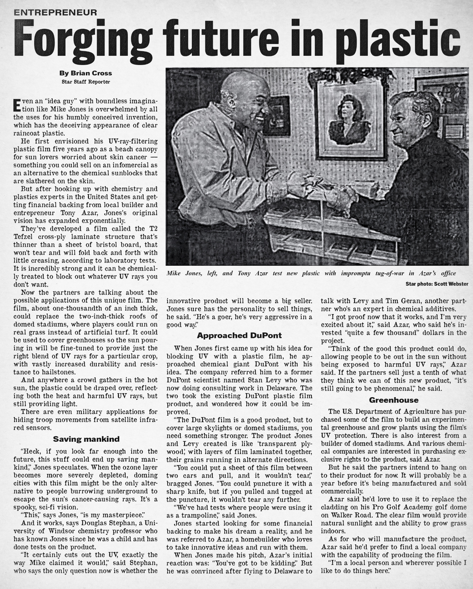 Windsor Star newspaper feature titled Forging future in plastic, showing Michael Jones and Tony Azar testing an early transparent plastic material.